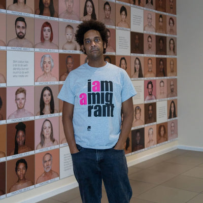 T-shirt: I Am a Migrant (grey) - Migration Museum Shop