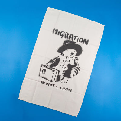 Migration Is Not a Crime Tea Towel