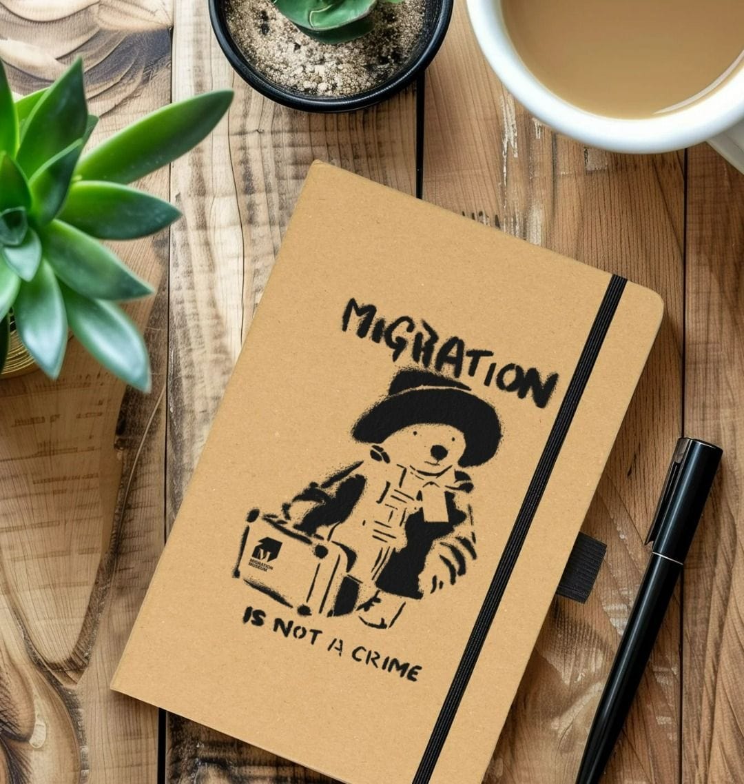 Migration is not a Crime recycled kraft notebook Migration Museum