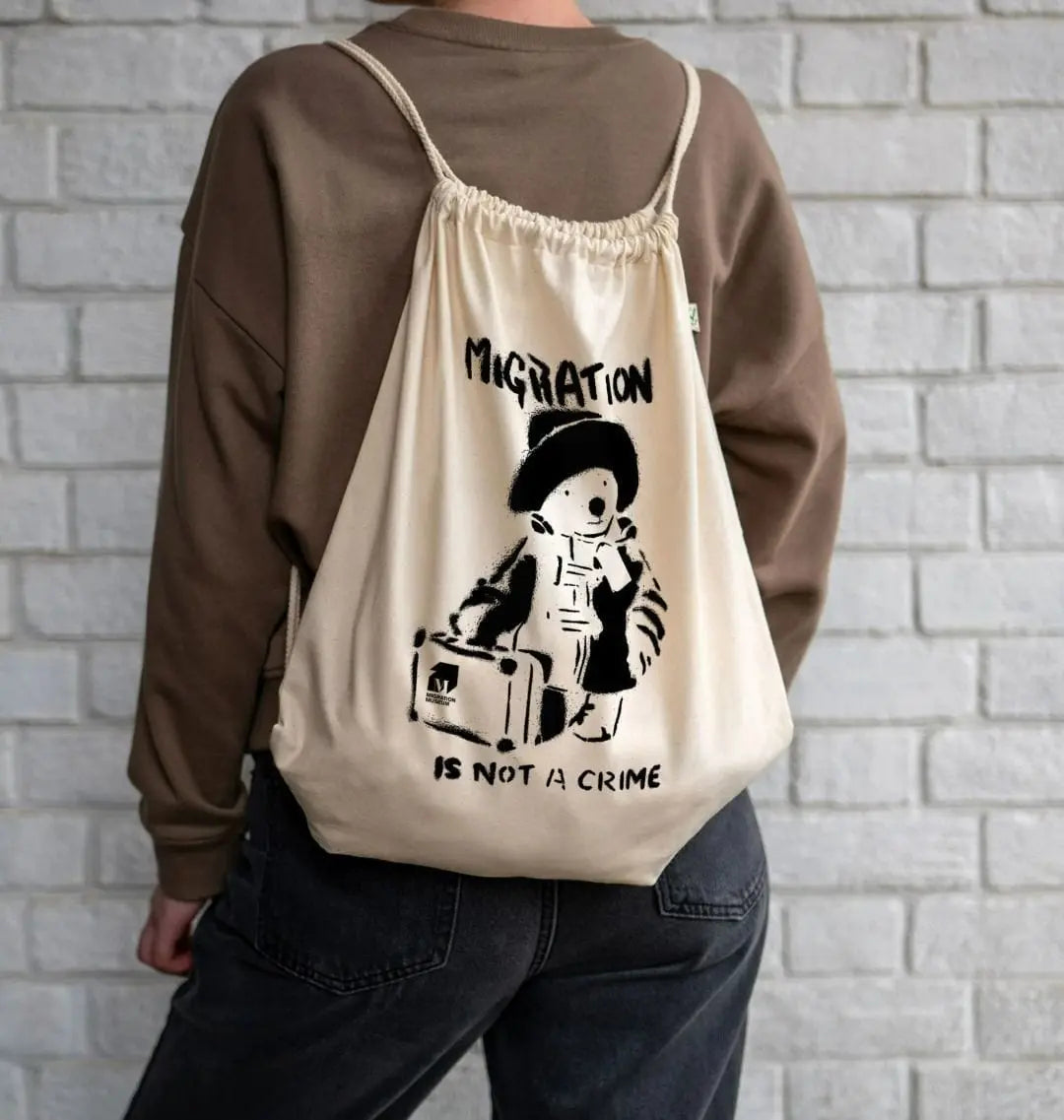 Migration is not a Crime drawstring bag Teemill