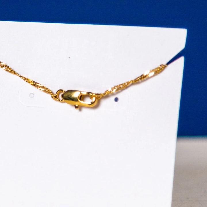 Isura - Pendant Necklace: Africa Map Outline - Migration Museum Shop